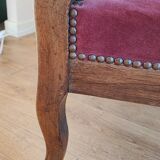 Red voltaire armchair