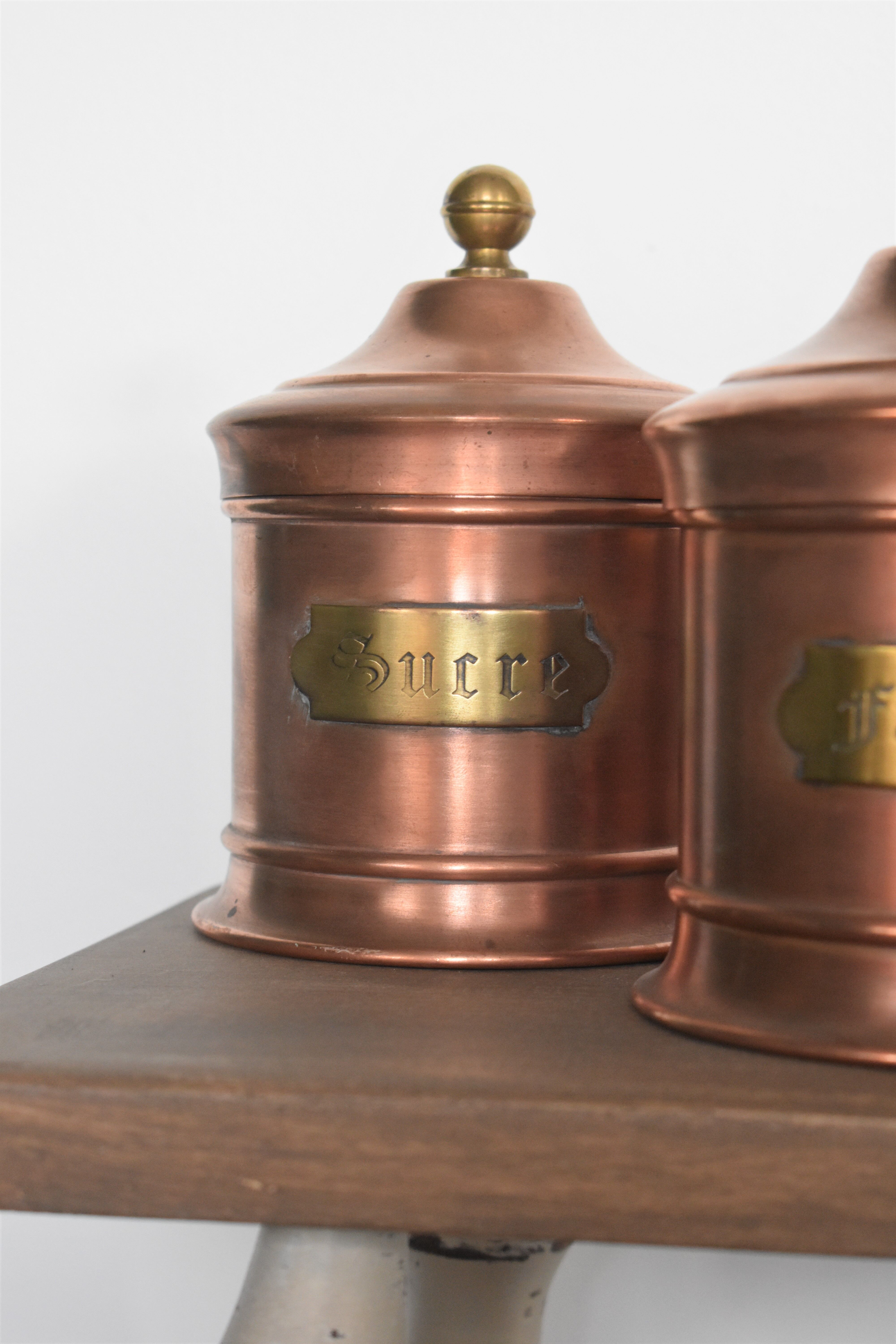 Trio of copper spice pots