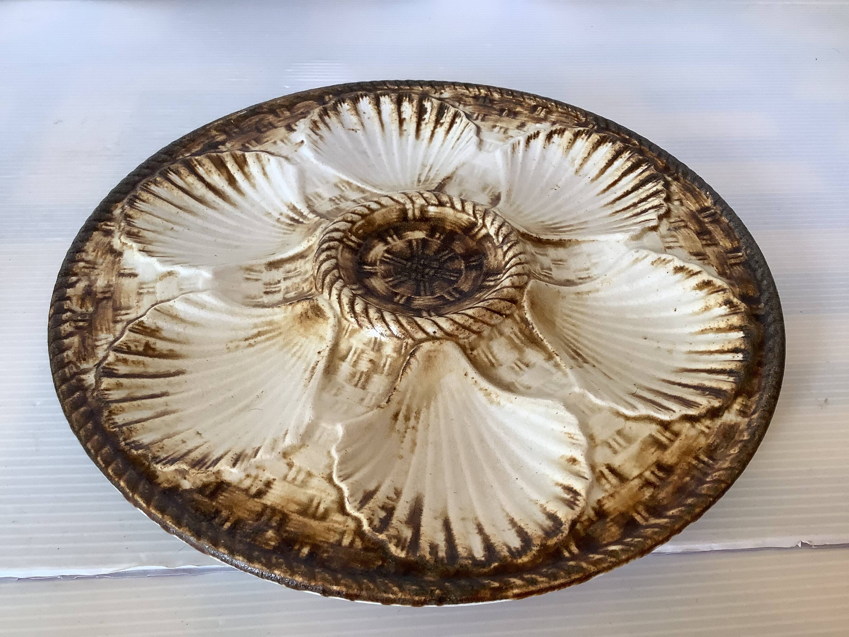 Four old Longchamps oyster plates