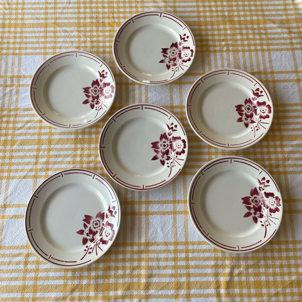 6 plates from the Badonviller pottery with a red flower design.