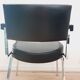 Pair of black skaï and chrome armchairs