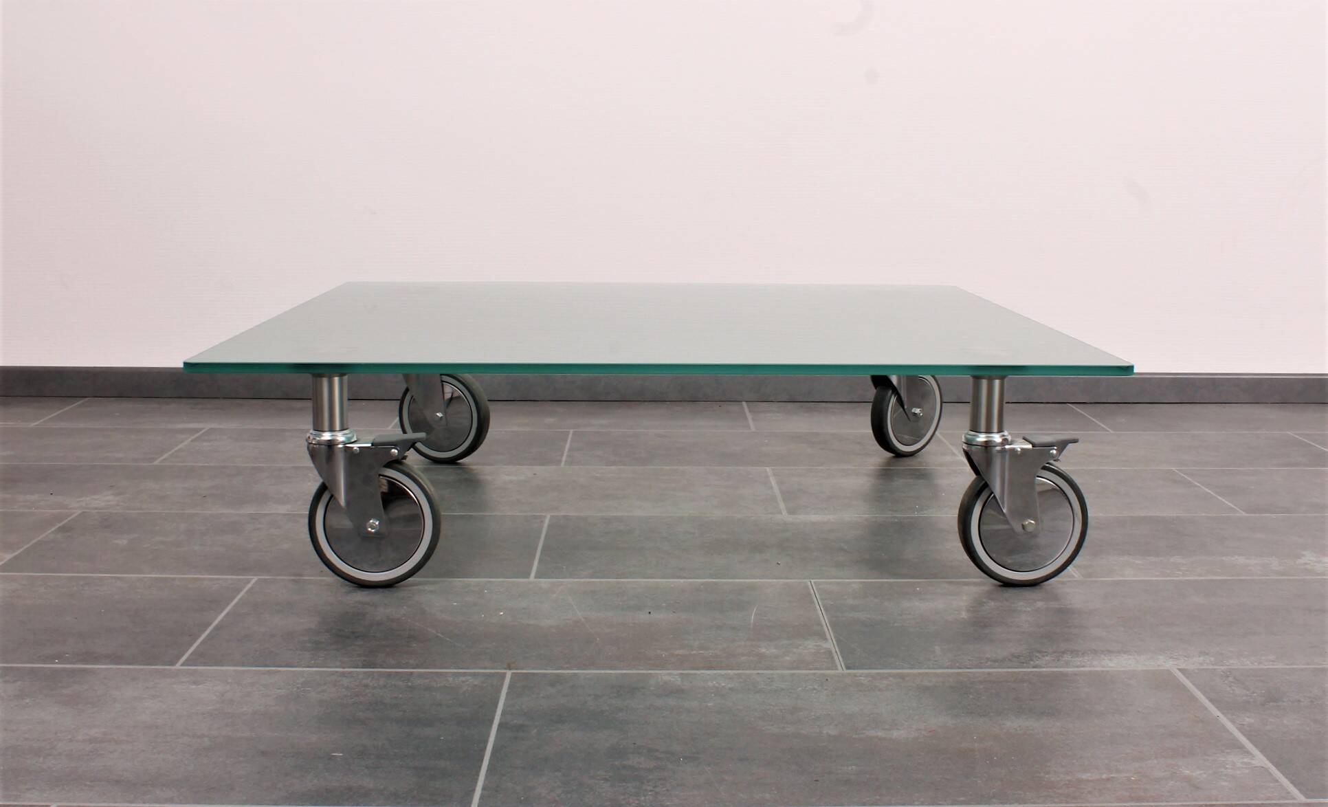 Wheeled glass coffee table