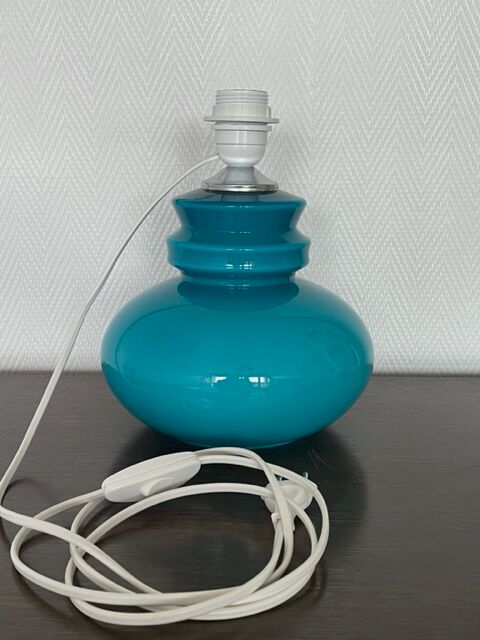 Blue opaline table lamp and vintage Maori fabric