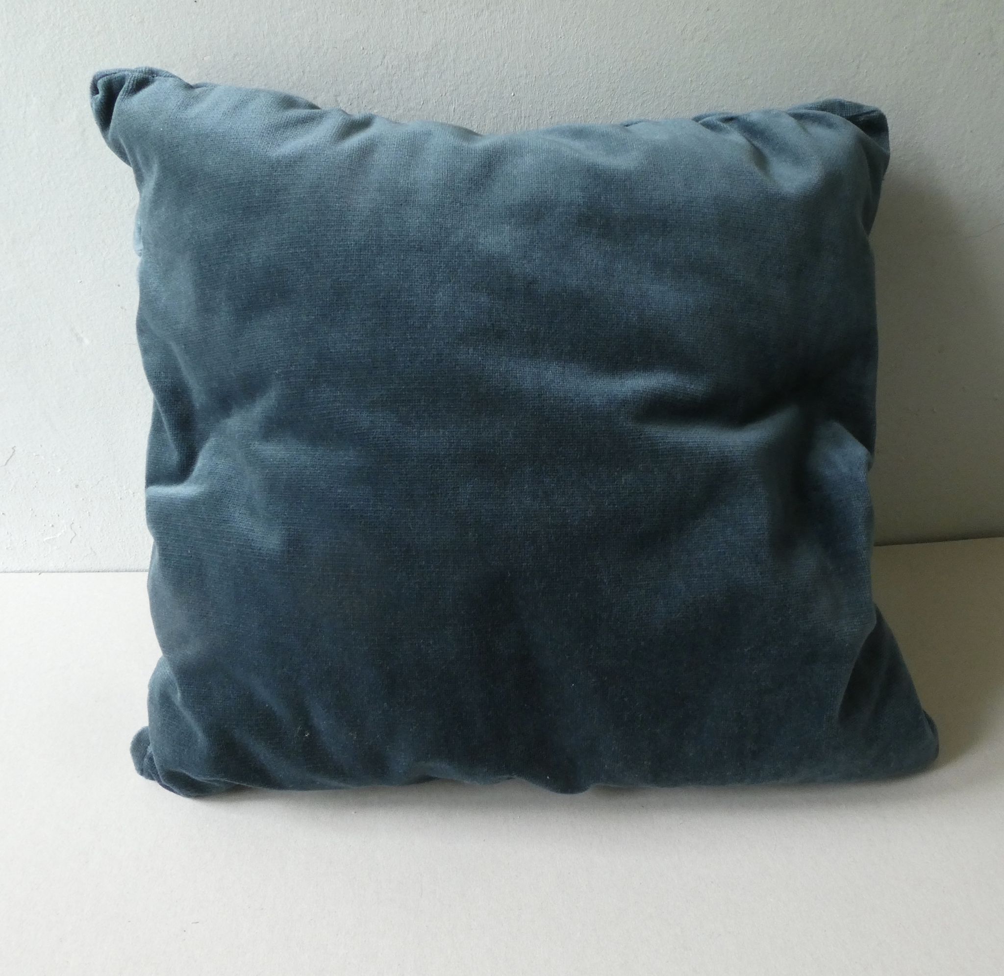 Pair of old cushions, in duck blue velvet, pleated effect