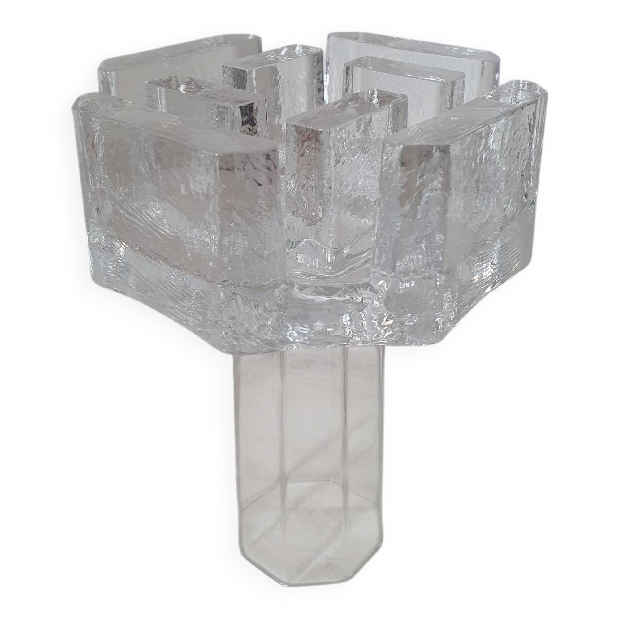 Candle holder or glass warmer with irregular ice effect.