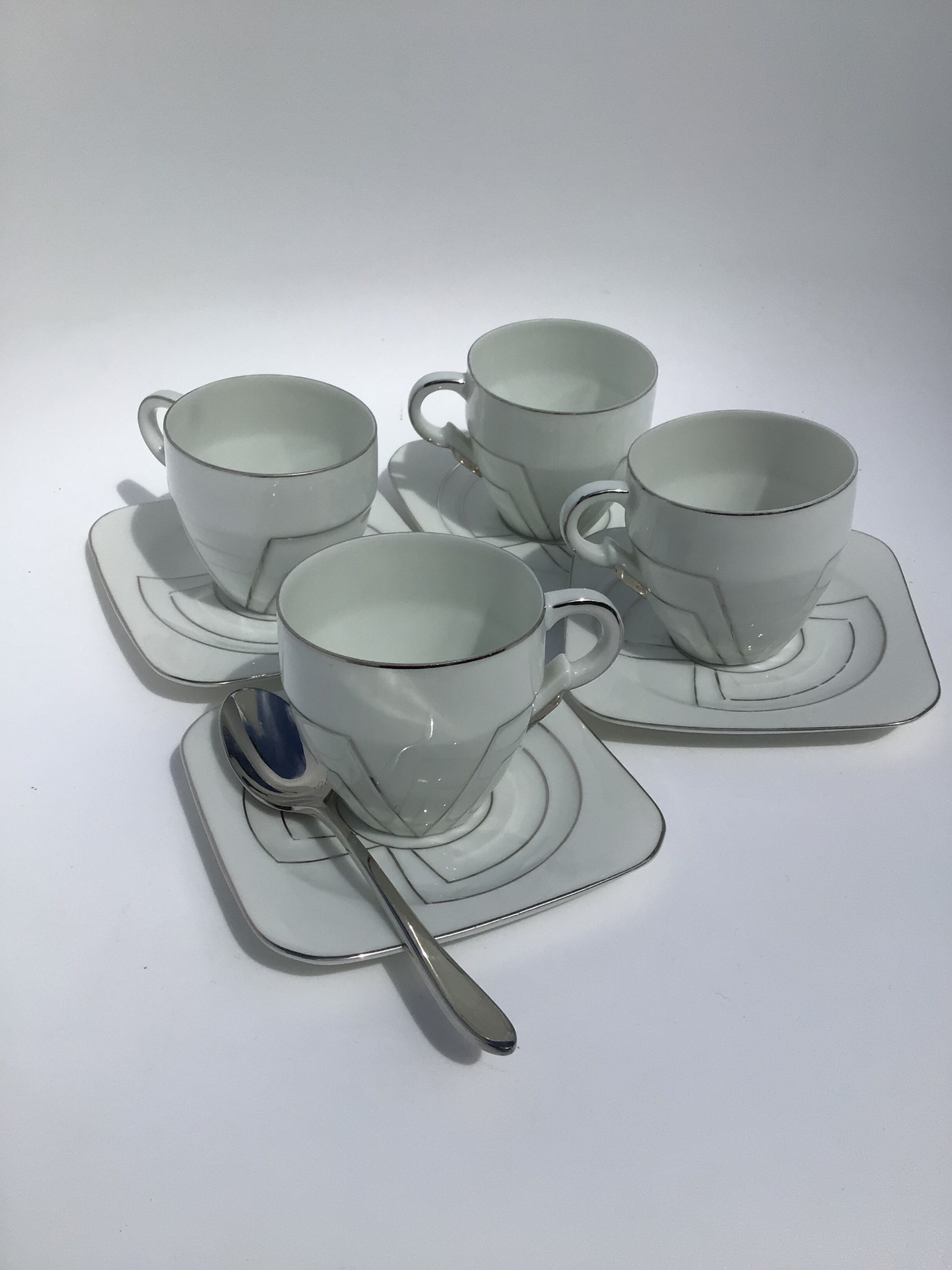 4 fine porcelain cups art deco silver thread