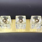 Exclusive wall sconces in crystal and brass by Peill & Putzler, Germany.