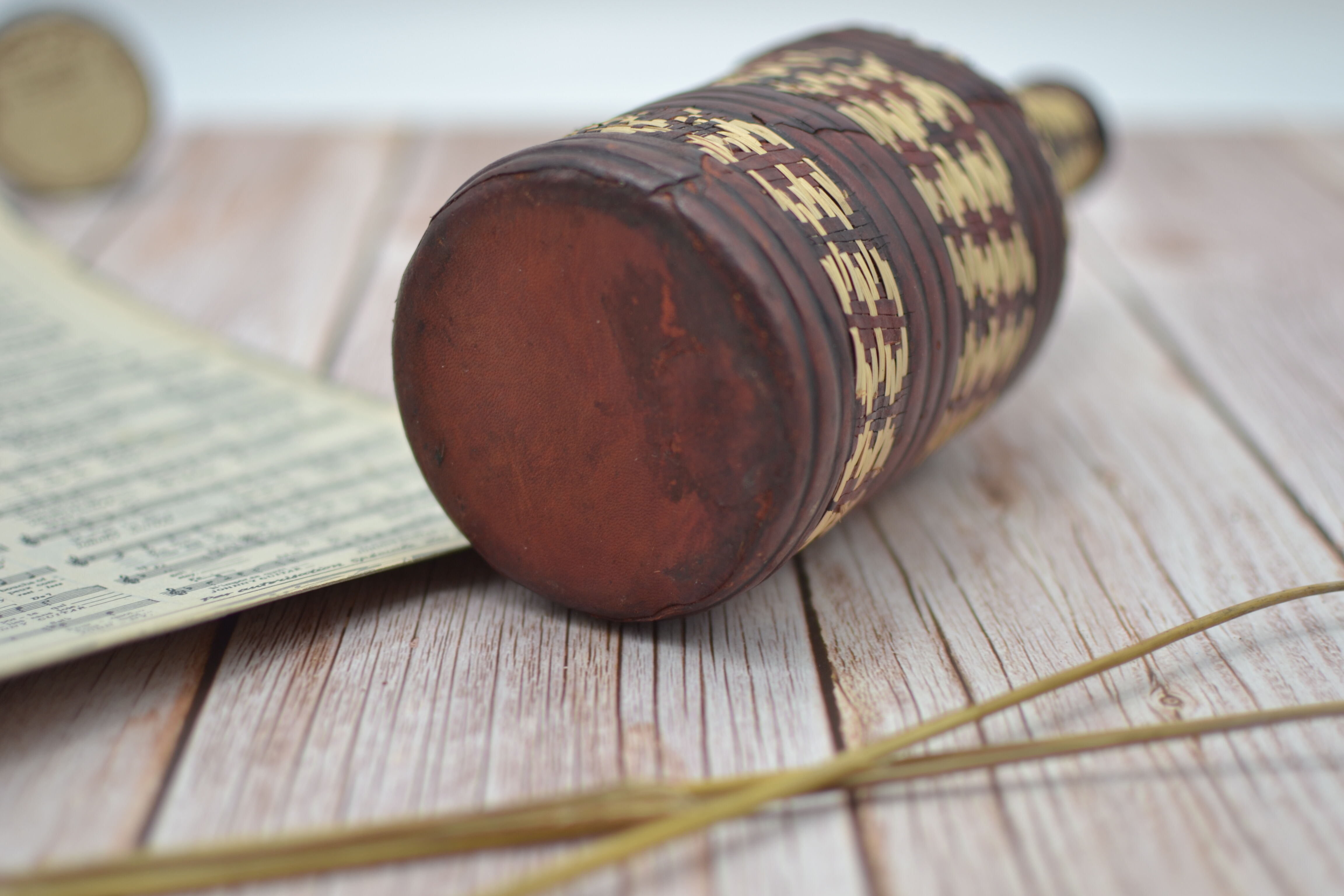 Set of 2 decorative vintage bottles covered with leather & wicker