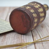 Set of 2 decorative vintage bottles covered with leather & wicker