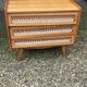 Rattan chest of drawers with tapered legs