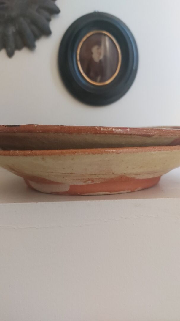 Decorated terracotta duo of dishes