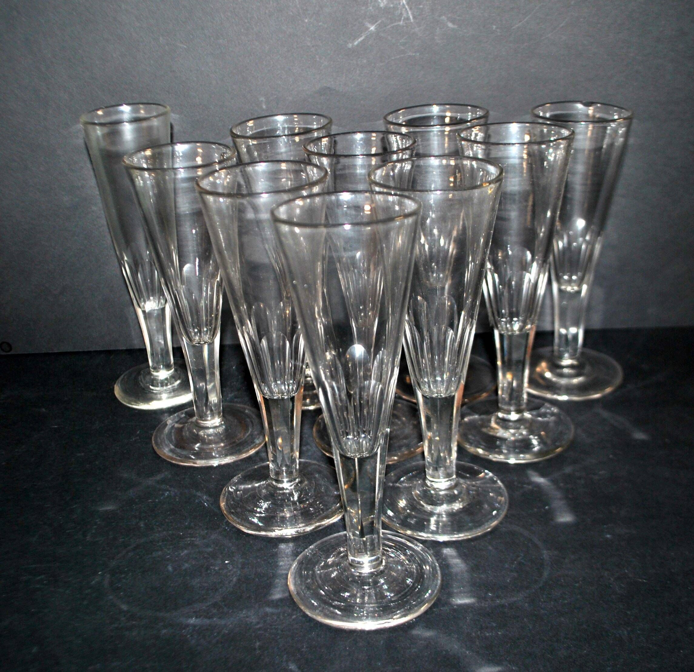Portieux? Set of 10 cut glass champagne flutes from 1900 bistro.