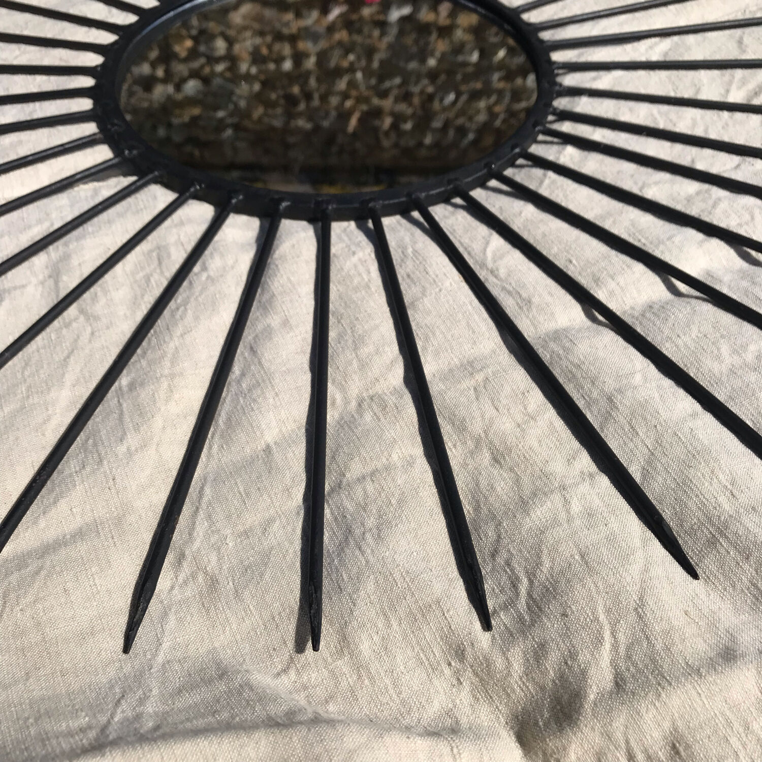 Vintage black metal sun mirror 1950