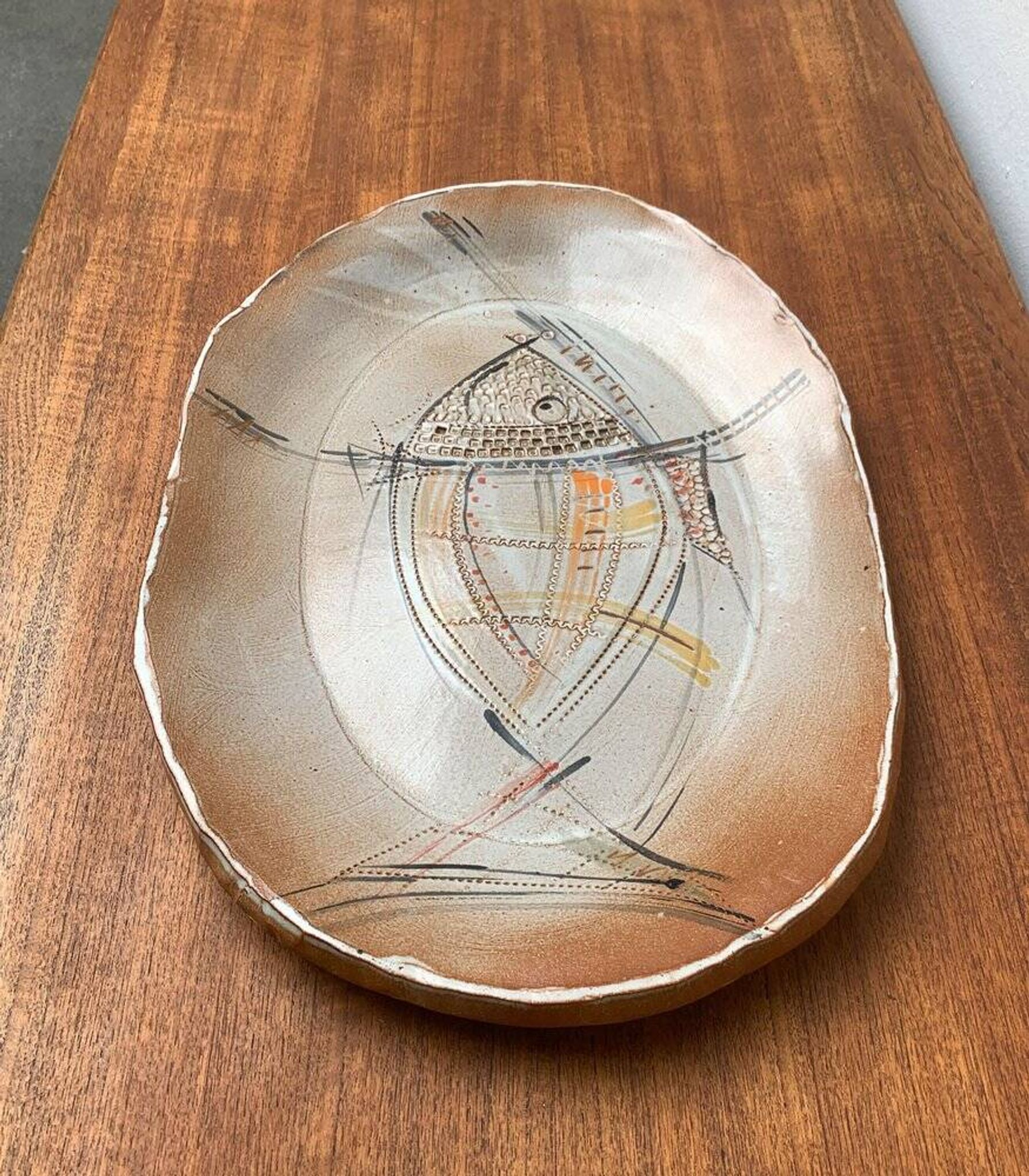 Large German ceramic plate with fish from the mid-century.