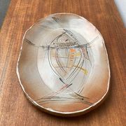 Large German ceramic plate with fish from the mid-century.