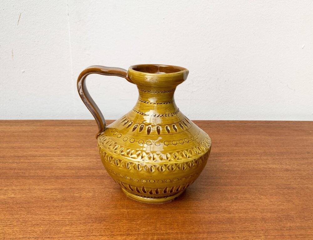 Italian pottery carafe from the mid-century by Aldo Londi for Bitossi, 1960s.