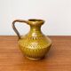 Italian pottery carafe from the mid-century by Aldo Londi for Bitossi, 1960s.