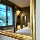 Antique beaded mirror with gold leaf