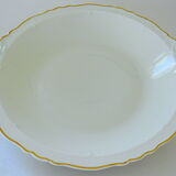 Hollow dish in white porcelain, golden lip.