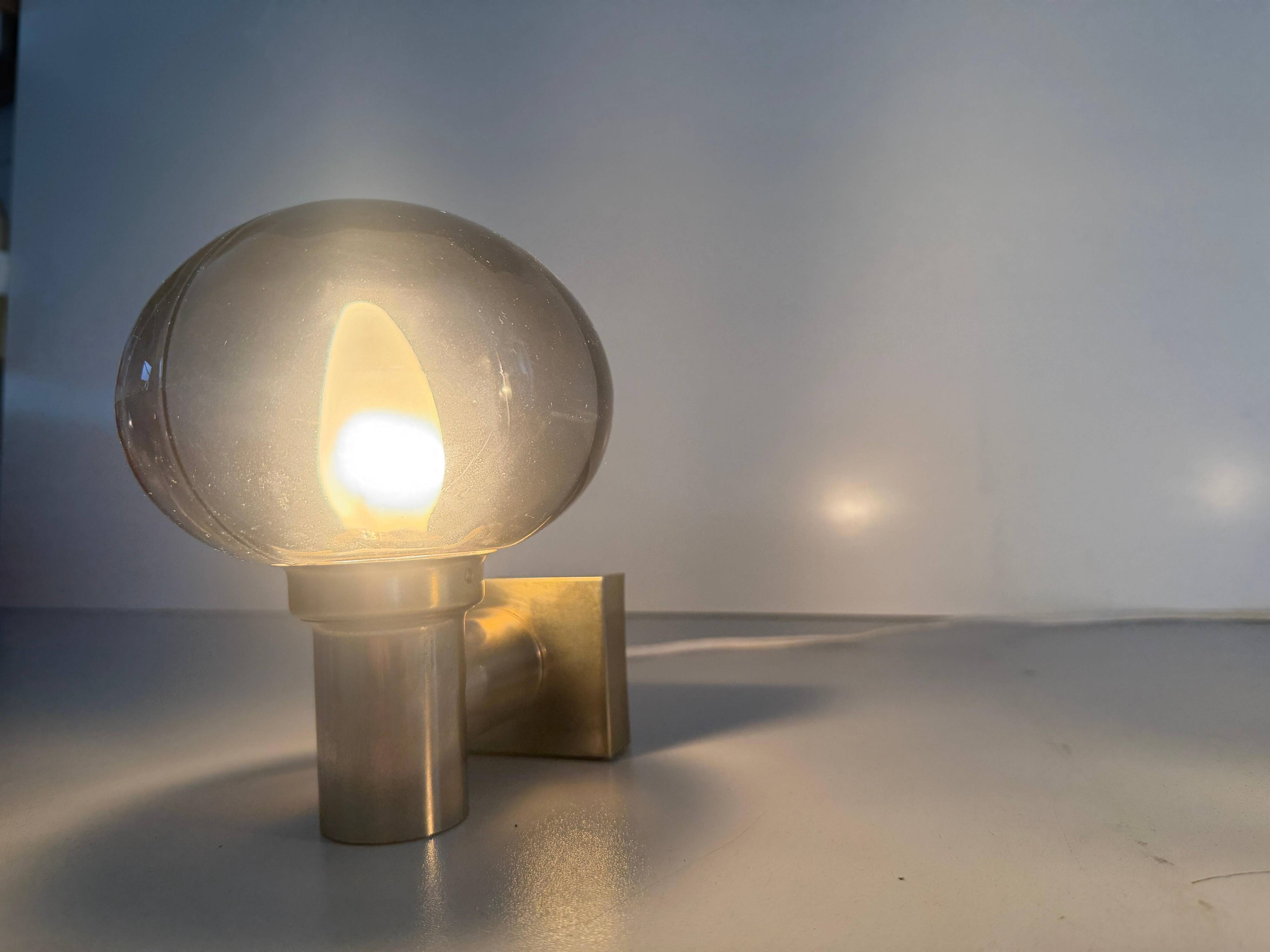 Pair of grey glass and chrome wall lights from the mid-century by N Leuchten, 1960s, Germany.