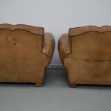 Pair of French club chairs with moustache back in cognac leather, 1940s