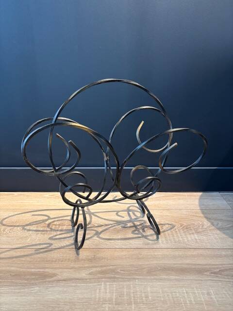 Vintage wrought iron magazine rack