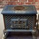 Cast iron and blue ceramic wood stove, from the Chauffette brand