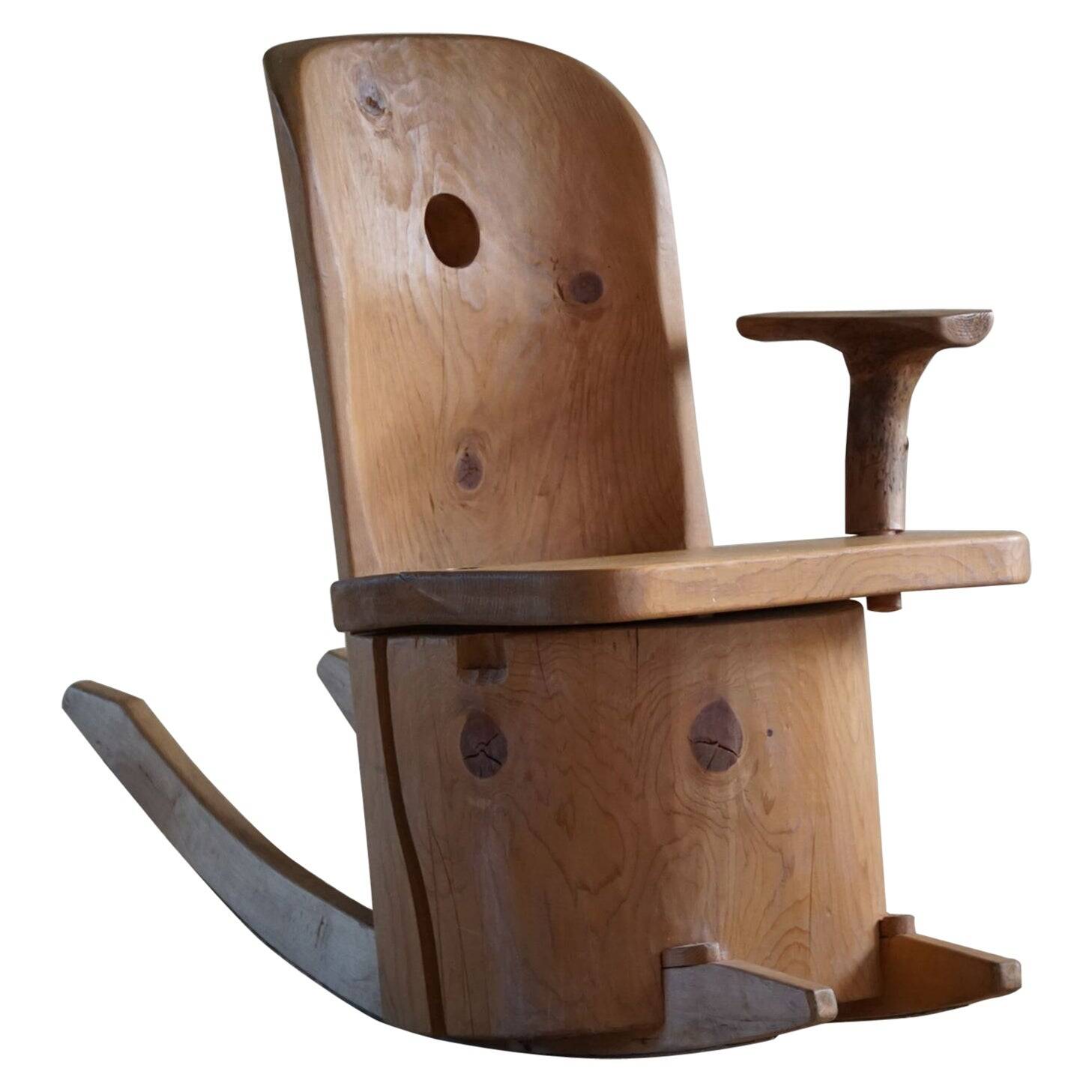 Unique sculptural rocking chair by the Finnish Matti Martikka in solid pine, 1960s.