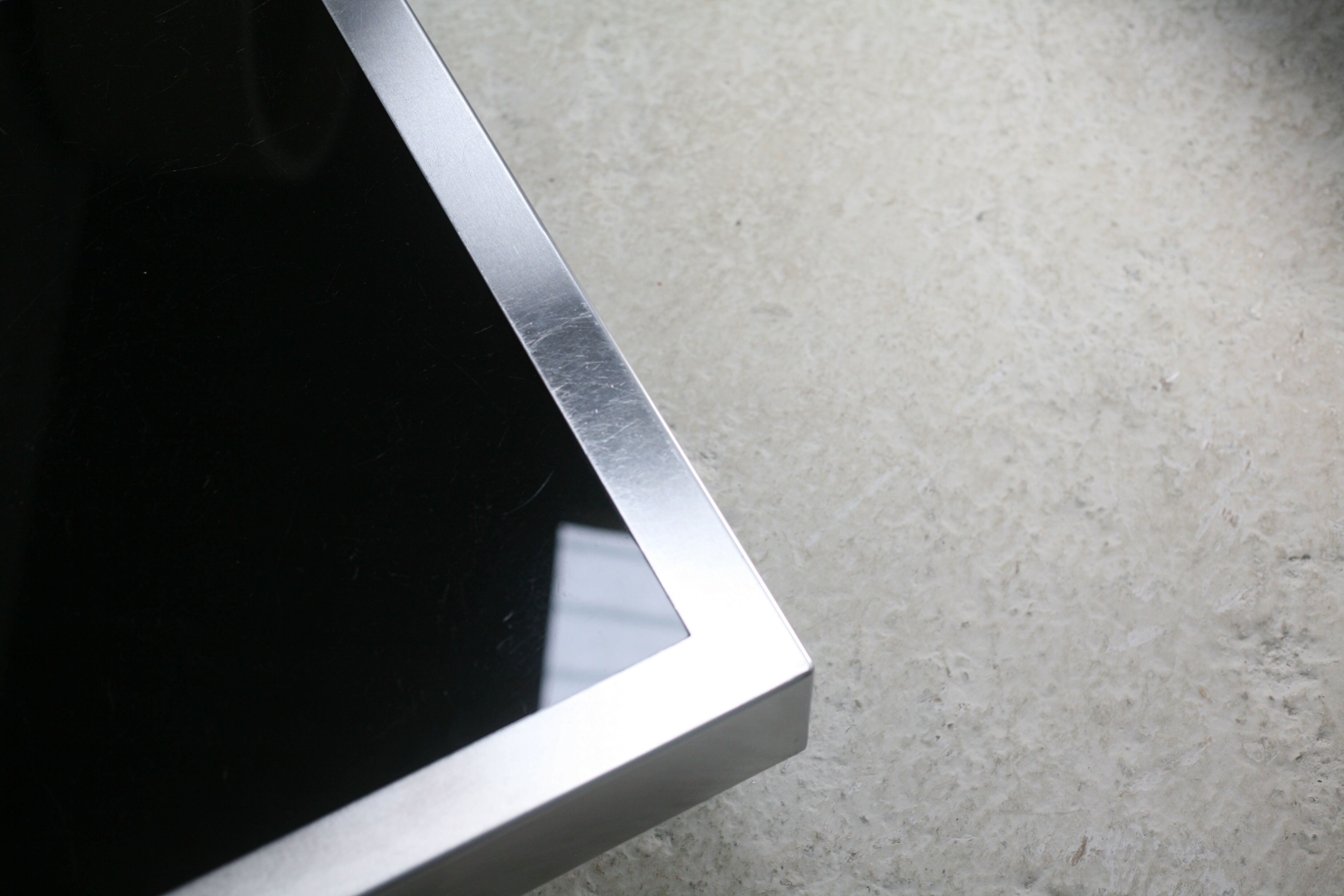 Coffee table in steel and black glass. France, circa 1970
