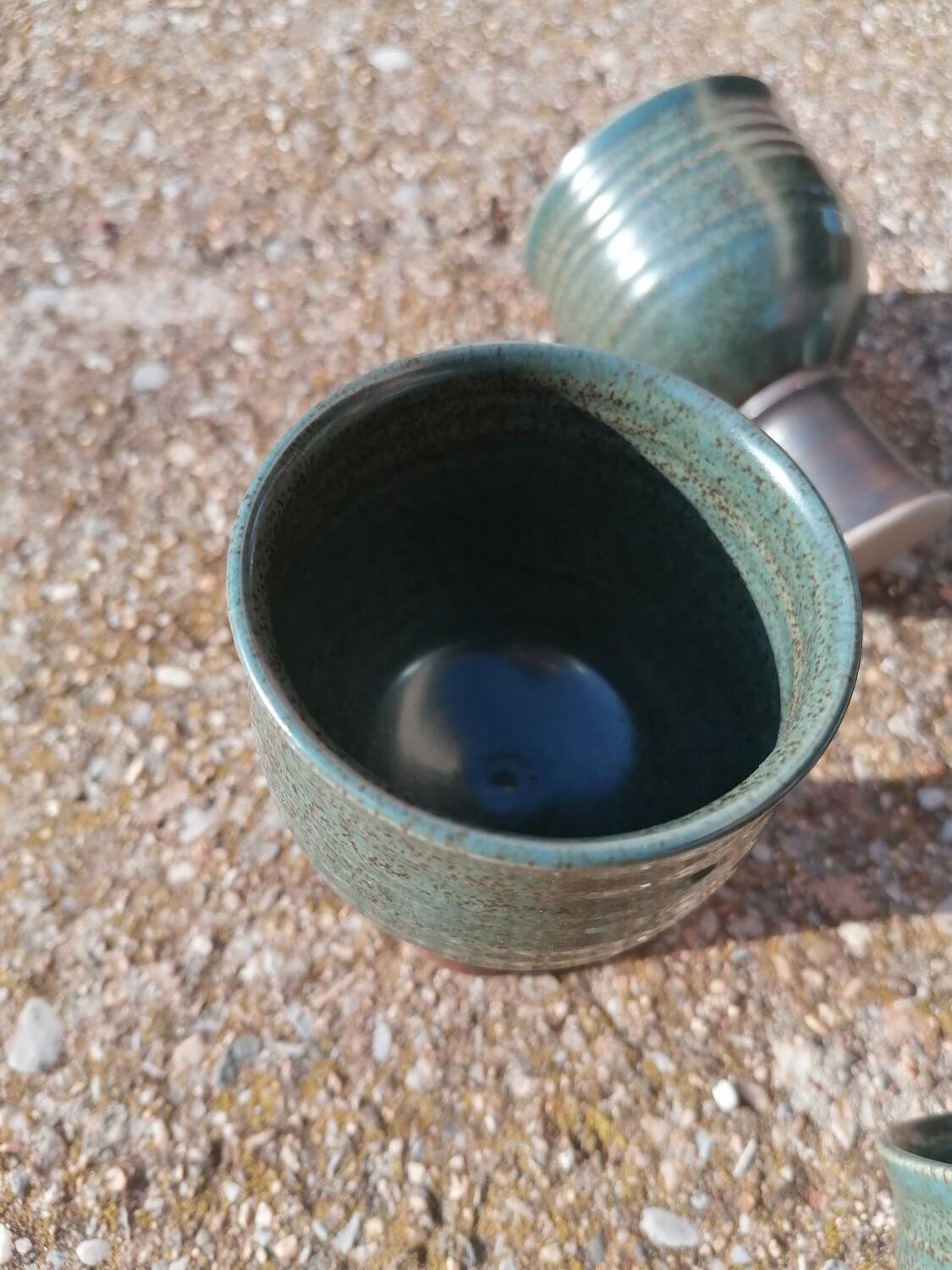 Original signed stoneware tumbler cups.