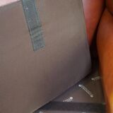 Elegant, smooth, and comfortable English Chesterfield wingback armchair in a beautiful classic color