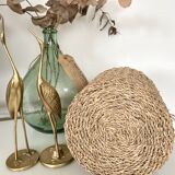 Glass bottle and braided rope