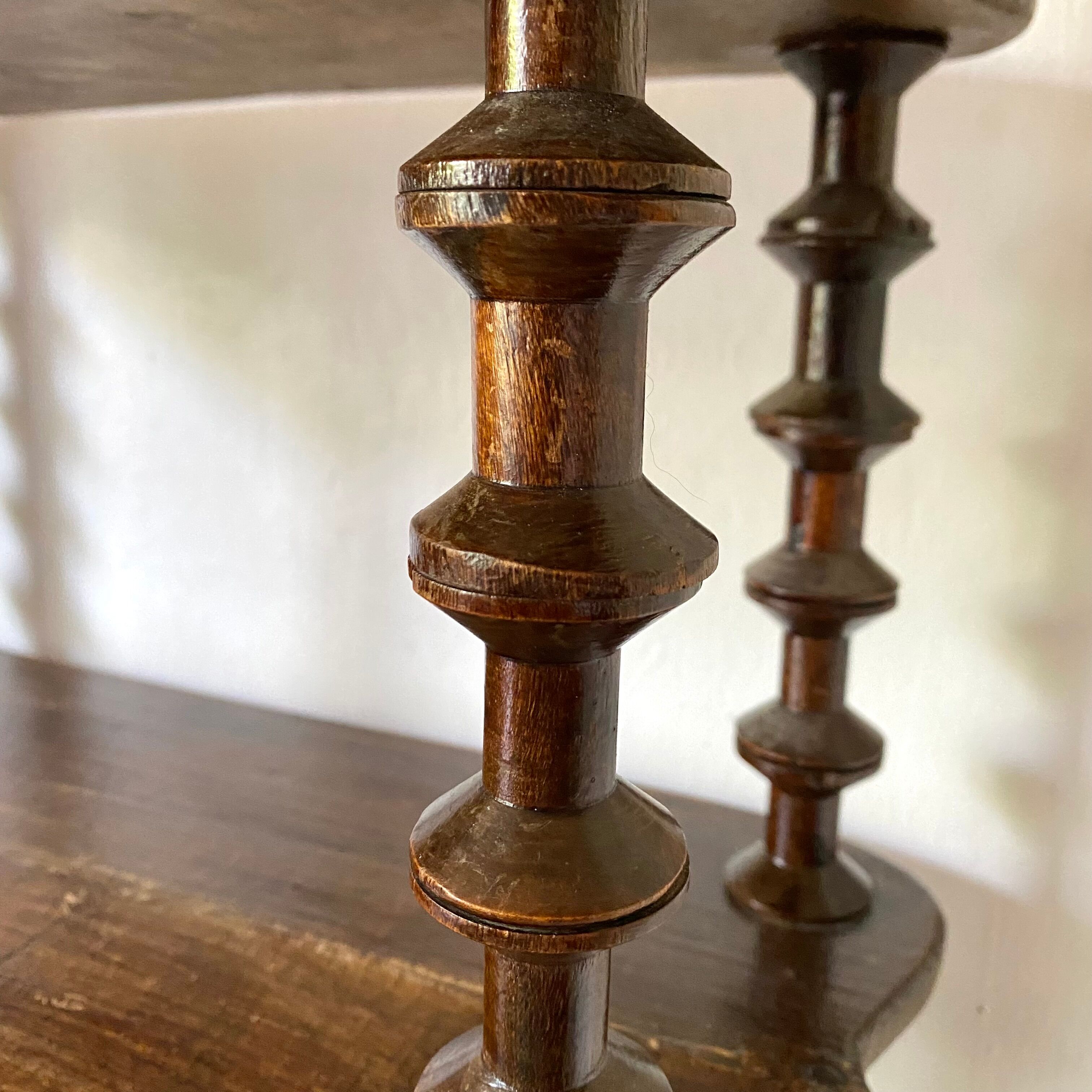 Old shelf in turned wood like reels