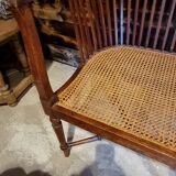 Wooden bench and cannage