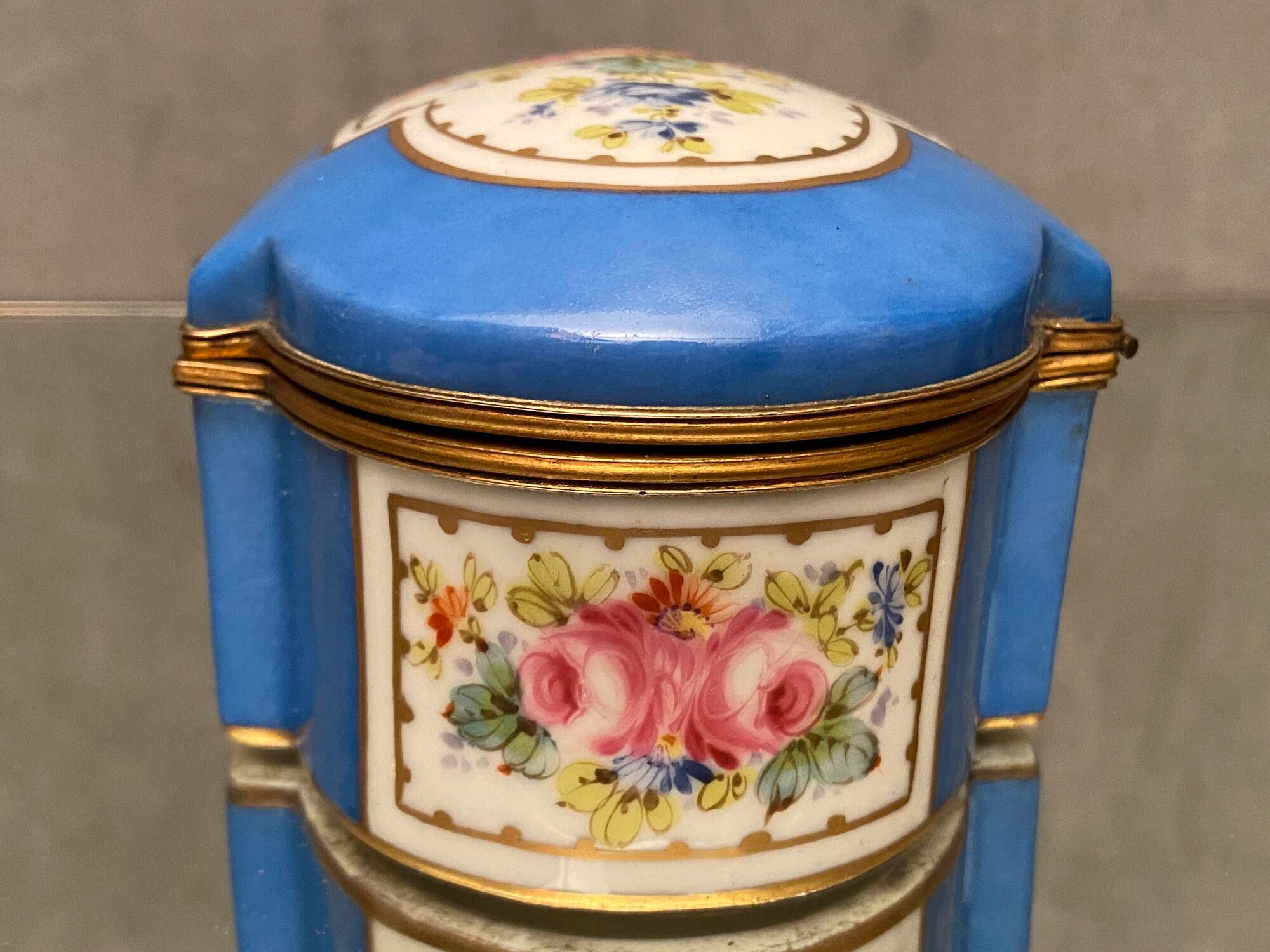 Domed porcelain box polychrome floral decoration on blue background brand Sèvres