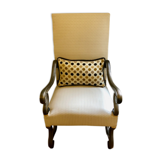 Armchair with contrasting handmade cushion