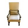 Armchair with contrasting handmade cushion
