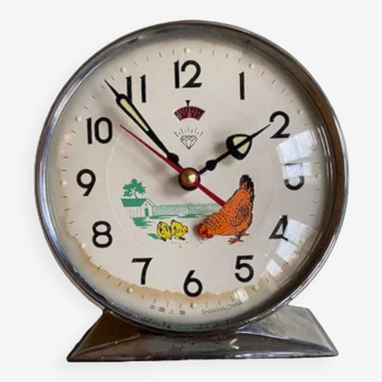 Vintage alarm clock with pecking hen, in perfect working order