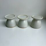 Trio of white shells bordered gold 50s