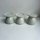 Trio of white shells bordered gold 50s