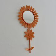 Grand miroir "fleur" 1970 en métal orange
