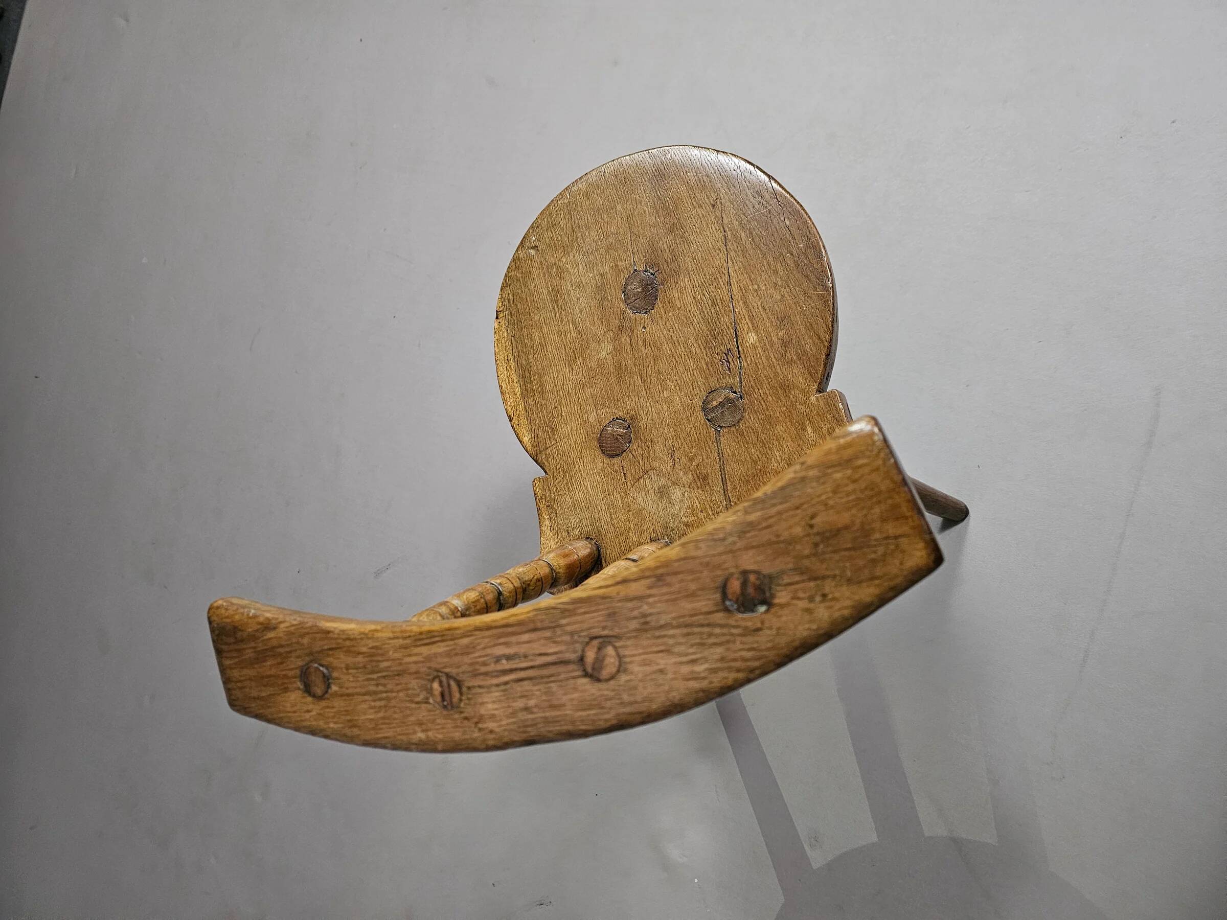 Old farmers tripod chair for decorative use