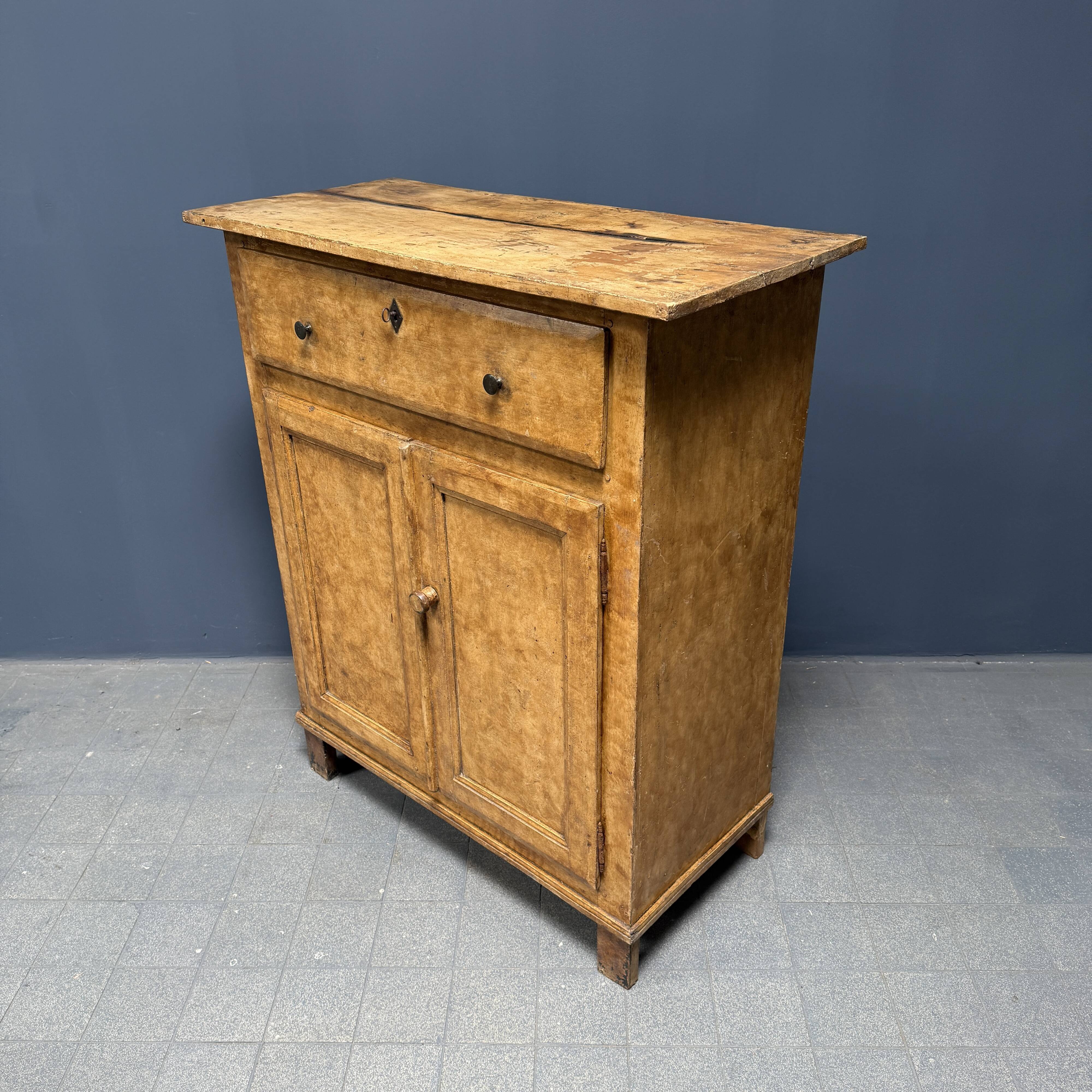 Old marbled ochre yellow French farmhouse cabinet
