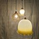 Suspension triple opaline with engraved and frosted glass in shades of yellow-orange.