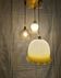 Suspension triple opaline with engraved and frosted glass in shades of yellow-orange.