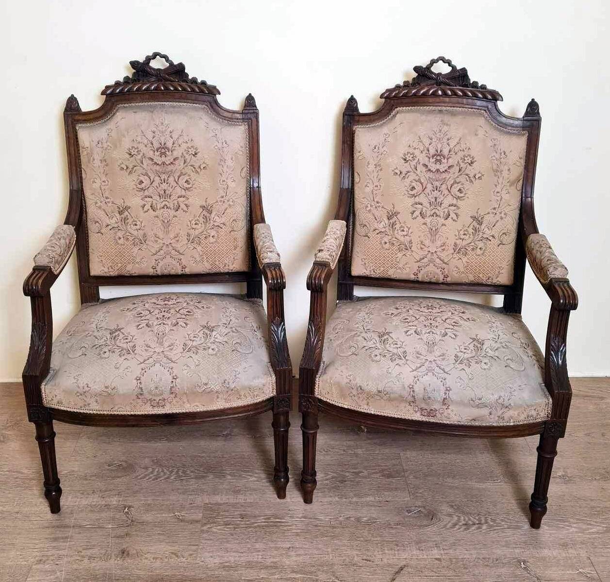 Pair of Louis XVI style queen-style armchairs in richly carved wood