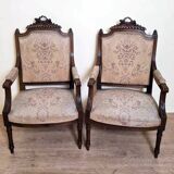 Pair of Louis XVI style queen-style armchairs in richly carved wood