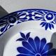 Round hollow ceramic dish with Saint Amand flower