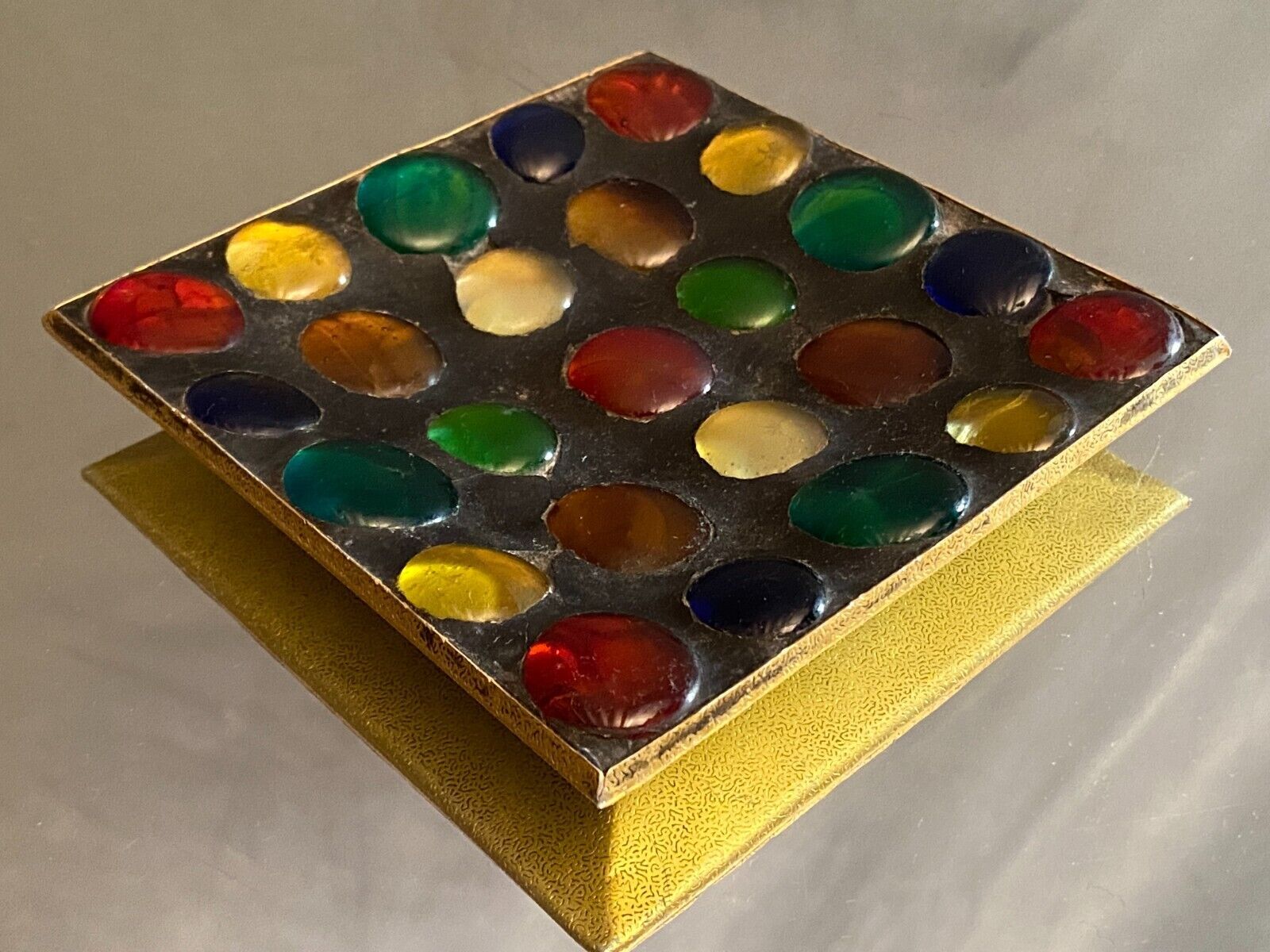 Square section cut glass and metal decorated with multicolored glass cabochons