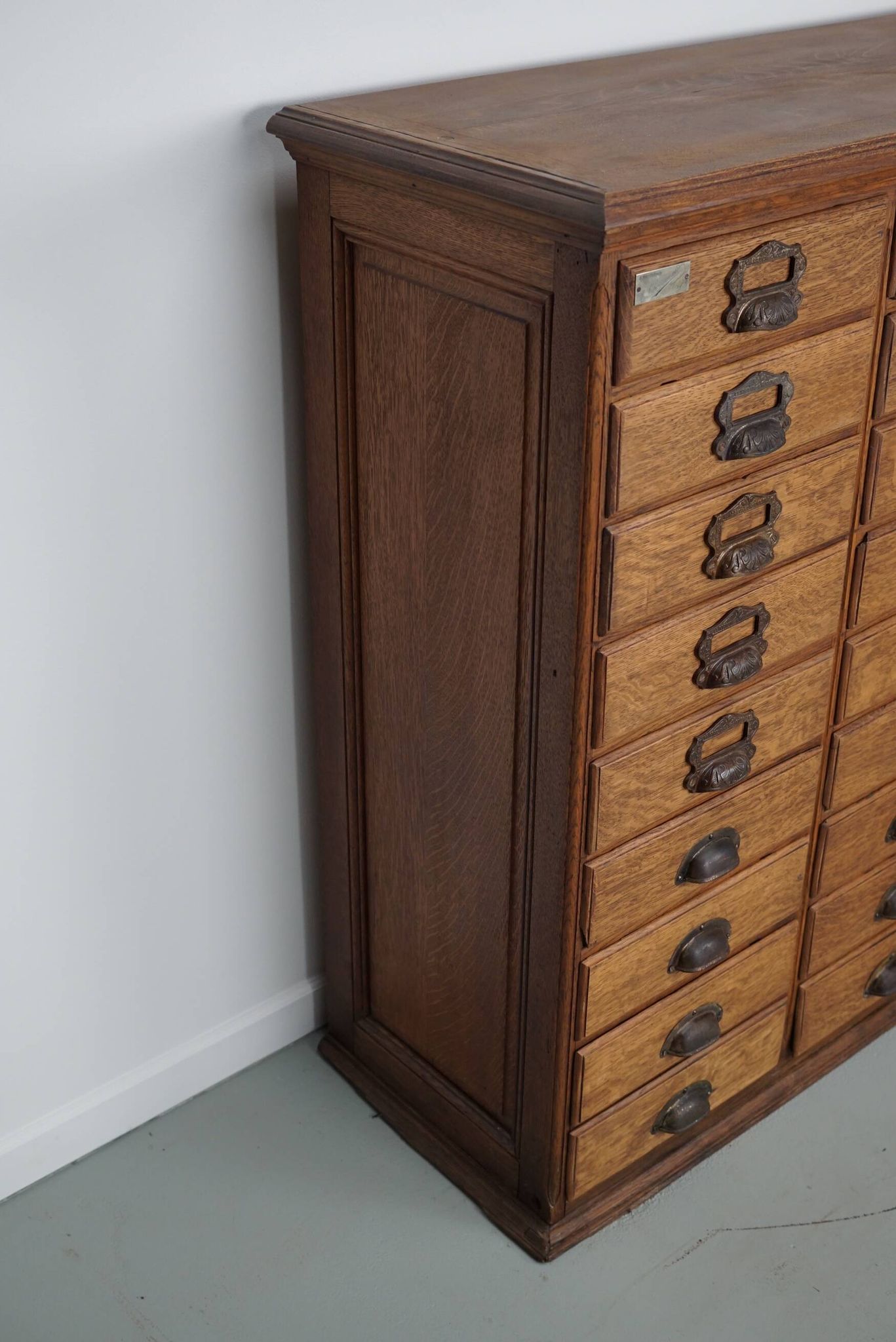 Antique French oak filing / apothecary cabinet by Chouanard, ca 1910